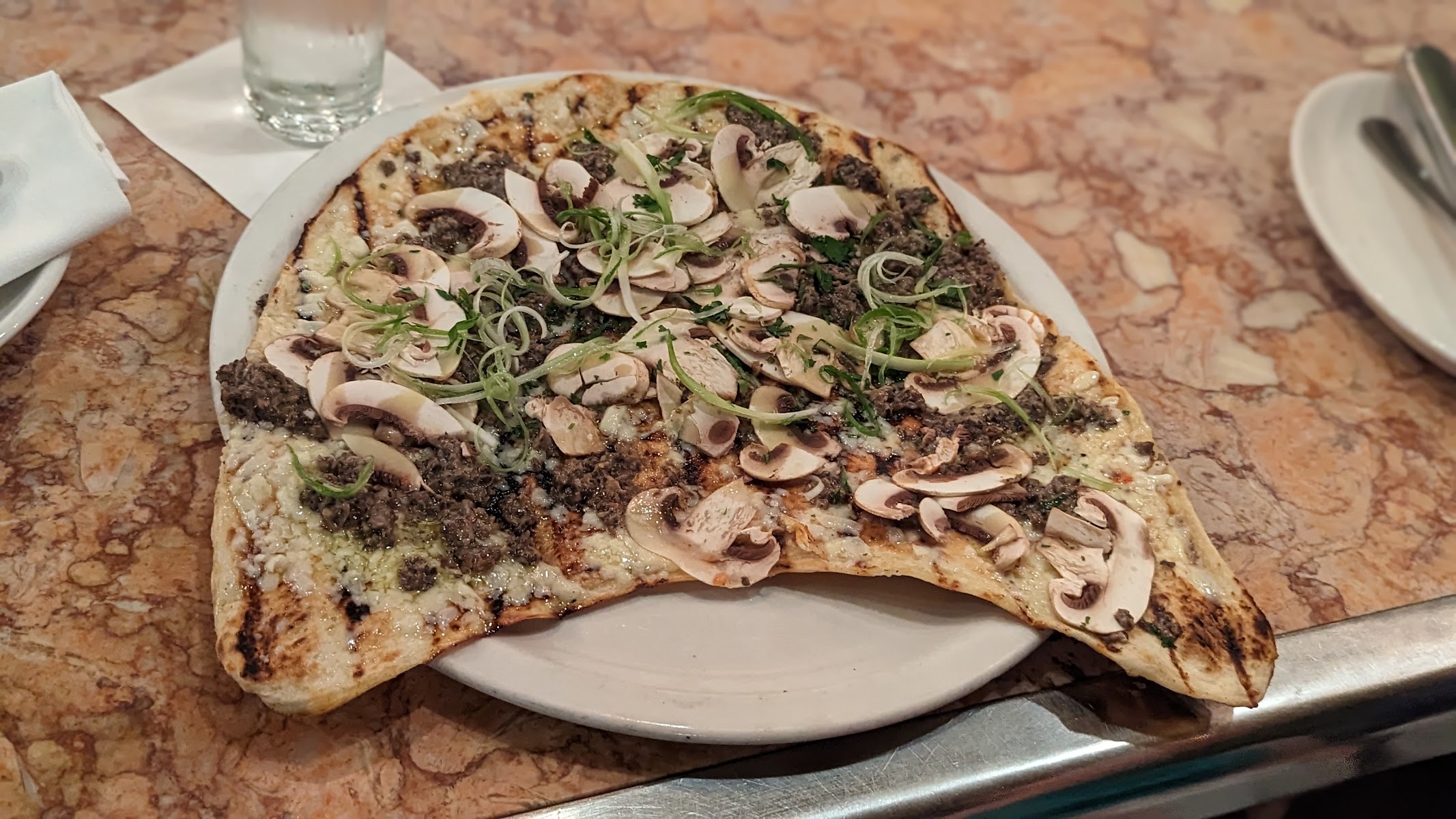 Al Forno grilled pizza with mushrooms